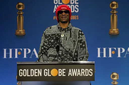 Snoop Dogg announces nominations for the 79th annual Golden Globe Awards at the Beverly Hilton Hotel on Monday, Dec. 13, 2021, in Beverly Hills, Calif. The 79th annual Golden Globe Awards will be held on Sunday, Jan. 9, 2022. (AP Photo/Chris Pizzello)