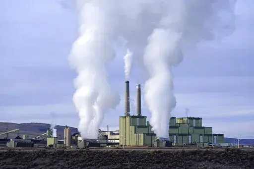 Steam billows from a coal-fired power plant Nov. 18, 2021, in Craig, Colo. The Supreme Court on Thursday, June 30, 2022, limited how the nation’s main anti-air pollution law can be used to reduce carbon dioxide emissions from power plants. By a 6-3 vote, with conservatives in the majority, the court said that the Clean Air Act does not give the Environmental Protection Agency broad authority to regulate greenhouse gas emissions from power plants that contribute to global warming. (AP Photo/Ric