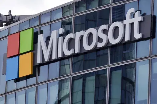 The Microsoft logo is seen in Issy-les-Moulineaux, outside Paris, France, April 12, 2016. In a scathing indictment of Microsoft corporate security and transparency, a Biden administration-appointed review board issued a report Tuesday, April 2, 2024, saying “a cascade of errors” by the tech giant let state-backed Chinese cyber operators break into email accounts of senior U.S. officials including Commerce Secretary Gina Raimondo. (AP Photo/Michel Euler, File)