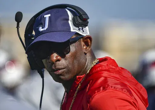 Jackson State head coach Deion Sanders looks on during an NCAA college football game against Mississippi Valley State in Jackson, Miss., Saturday, Sept. 24, 2022. (Hannah Mattix/The Clarion-Ledger via AP)