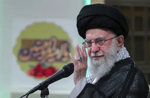 In this photo released by an official website of the office of the Iranian supreme leader, Supreme Leader Ayatollah Ali Khamenei gestures in a ceremony to mark the Shiite holiday of Eid al-Ghadir, in Tehran, Iran, Tuesday, June 25, 2024. Khamenei called Tuesday for "maximum" voter turnout in this week's presidential election to "overcome the enemy," denouncing politicians who he described as believing that everything good comes from the United States. (Office of the Iranian Supreme Leader via AP