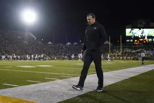 Florida head coach Billy Napier roams the sidelines during the second half of an NCAA college football game against Missouri Saturday, Nov. 18, 2023, in Columbia, Mo. (AP Photo/Jeff Roberson, File)