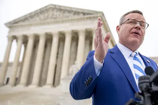 North Carolina House Speaker Tim Moore speaks in front of the Supreme Court in Washington, Dec. 7, 2022. North Carolina legislators repealed on Wednesday, March 29, 2023, the state’s requirement that someone obtain a permit from a local sheriff before buying a pistol, as the Republican-controlled legislature overrode successfully one of Democratic Gov. Roy Cooper’s vetoes for the first time since 2018. (AP Photo/Andrew Harnik, File)