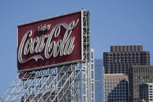 A Coca-Cola sign is shown in San Francisco, Tuesday, Oct. 27, 2020. (AP Photo/Jeff Chiu,File)