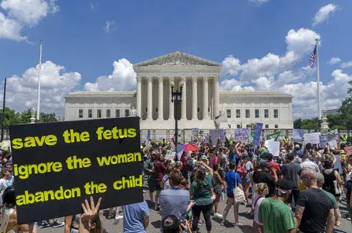 Abortion-rights protesters demonstrate outside the Supreme Court in Washington, Saturday, June 25, 2022. A new poll finds a growing percentage of Americans calling out abortion or women’s rights as priorities for the government in the wake of the Supreme Court’s decision to overturn Roe v. Wade, especially among Democrats and those who support abortion access.  (AP Photo/Gemunu Amarasinghe, File)