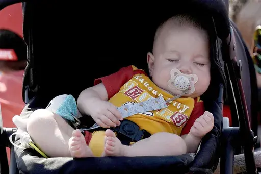 A baby sleeps July 23, 2023, in St. Joseph, Mo. Liam and Olivia have for the fifth year topped the list of top baby names for brand new boys and girls in the U.S., according to the Social Security Administration's list released Friday, May 10, 2024. And Mateo joins the top 10 baby names list for the first time. (AP Photo/Charlie Riedel, File)