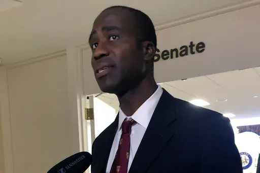 Dr. Joseph Ladapo speaks with reporters after the Florida Senate confirmed his appointment as the state's surgeon general on Feb. 23, 2022, in Tallahassee, Fla. An analysis that was the basis of a highly criticized recommendation from Florida’s surgeon general cautioning young men against getting the COVID-19 vaccine omitted information that showed catching the virus could increase the risk of a cardiac-related death much more than getting the shot. That's according to drafts of the analysis o