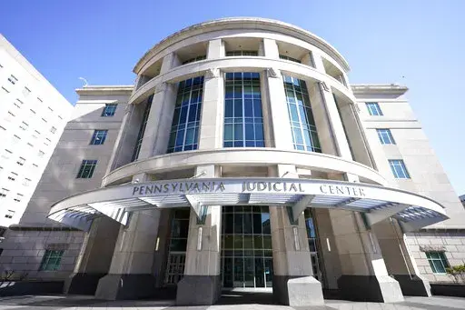 This Nov. 6, 2020, photo shows a general view of the Pennsylvania Judicial Center, home to the Commonwealth Court in Harrisburg, Pa. The Supreme Court has turned away efforts from Republicans in North Carolina and Pennsylvania to block state court-ordered congressional districting plans more favorable to Democrats. In separate orders late March 7, 2022, the justices are allowing maps selected by each state's Supreme Court to be in effect for the 2022 elections. (AP Photo/Julio Cortez, File)
