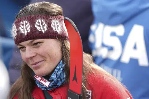United States' Breezy Johnson at the finish area of a downhill run of a women's team combined event, at the Alpine Ski World Championships, in Saalbach-Hinterglemm, Austria, Tuesday, Feb. 11, 2025. (AP Photo/Giovanni Auletta)