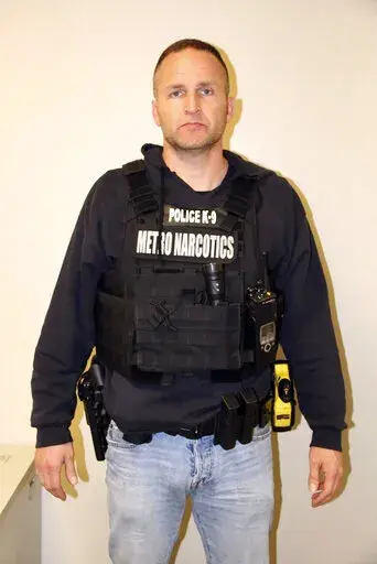 This March 13, 2020, photo provided by the Louisville Metro Police Department shows Officer Brett Hankison. A judge has denied a request from the legal team of Hankison, who took part in the deadly 2020 raid on Breonna Taylor’s home, to bar the media from part of his upcoming trial. But Jefferson Circuit Judge Ann Bailey Smith ruled Thursday, Jan. 27, 2022, that the media can’t bring cameras into the courtroom while individual prospective jurors are questioned ahead of the trial. (Louisville