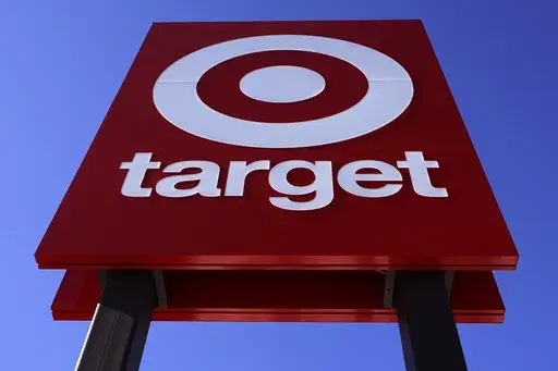 The bullseye logo on a sign outside the Target store in Quincy, Mass., Monday, Feb. 28, 2022. Target says it will stop selling a product dedicated to Civil Rights icons after a now-viral TikTok spotlighted some significant errors. (AP Photo/Charles Krupa, File)