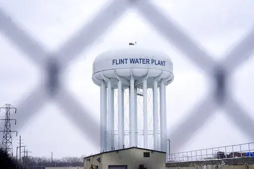 The Flint water plant tower is pictured on Jan. 6, 2022, in Flint, Mich. A judge dismissed criminal charges against former Michigan Gov. Rick Snyder in the Flint water crisis, months after the state Supreme Court said indictments returned by a one-person grand jury were invalid. (AP Photo/Carlos Osorio, File)