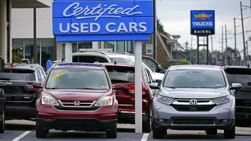 Used car are on display on a lot in Wexford, Pa., Thursday, Sept. 29, 2022. The Commerce Department releases its revised estimate of how the U.S. economy fared in the fourth quarter on Thursday, Feb. 23, 2023. (AP Photo/Gene J. Puskar, File)