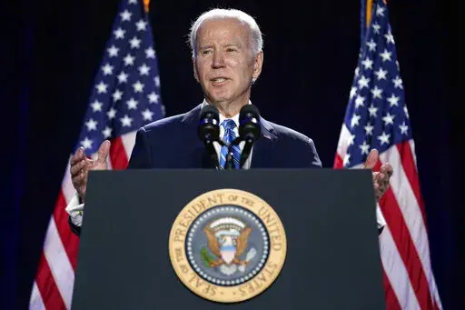 President Joe Biden speaks to the House Democratic Caucus Issues Conference, Wednesday, March 1, 2023, in Baltimore. Biden's administration is starting a push to get Congress to fund measures to help prosecute fraud in governmental pandemic relief programs. The plans also include measures to prevent future identity theft and help victims. The request is for $1.6 billion.(AP Photo/Evan Vucci)