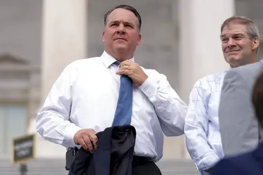 Rep. Alexander Mooney, R-W.Va., left, and Rep. Jim Jordan, R-Ohio, right, appear at a news conference on the steps of the Capitol in Washington, July 29, 2021. The May 10 primary contest in West Virginia's 2nd Congressional District between Republican colleagues Rep. Alex Mooney and Rep. David McKinley is a test of former Donald Trump’s clout in the state. McKinley voted to pass the infrastructure bill and was condemned by both Trump and Mooney for doing so. (AP Photo/Andrew Harnik, File)