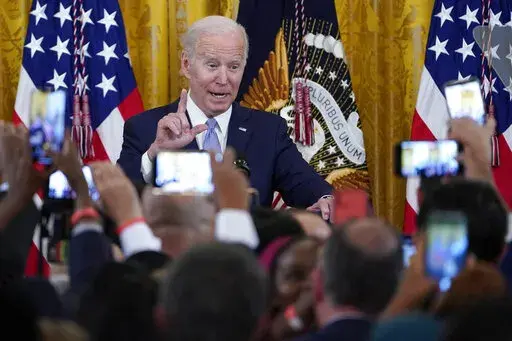 President Joe Biden speaks during a reception to celebrate Eid al-Fitr in the East Room of the White House in Washington, May 2, 2022. Biden's approval rating dipped to the lowest point of his presidency in May, a new poll shows, with deepening pessimism emerging among members of his own Democratic Party. (AP Photo/Susan Walsh, File)
