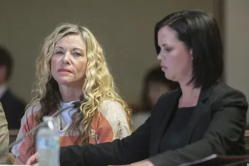 Lori Vallow Daybell glances at the camera during her hearing in Rexburg, Idaho., on March 6, 2020. The investigation started roughly 29 months ago with two missing children. It soon grew to encompass five states, four suspected murders and claims of an unusual, doomsday-focused religious beliefs involving "dark spirits" and "zombies." On Monday, April 10, 2023, an Idaho jury will begin the difficult task of deciding the veracity of those claims and others in the triple murder trial of Lori Vallo