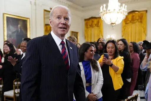 President Joe Biden departs after speaking an event to celebrate Equal Pay Day and Women's History Month in the East Room of the White House, Tuesday, March 15, 2022, in Washington. (AP Photo/Patrick Semansky)
