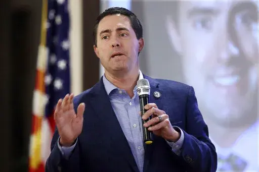 Ohio Secretary of State Frank LaRose speaks to the Fairfield County Lincoln Republican Club in Pickerington, Ohio, on March 24, 2022. The Republican Secretary of State said those voters who choose to hold onto their paper ballots until Nov. 8 must deliver them to their county board of elections office. Poll workers at precinct-level voting locations cannot accept them, he said. (AP Photo/Paul Vernon, File)