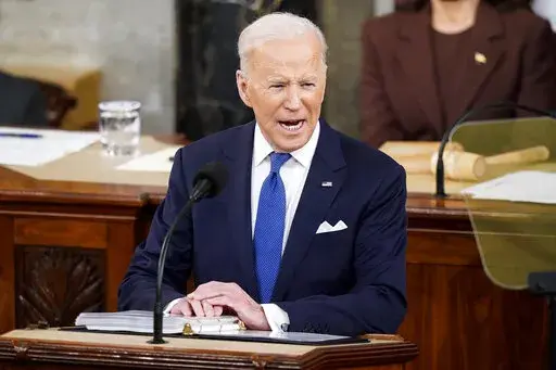 President Joe Biden delivers his State of the Union address to a joint session of Congress at the Capitol, Tuesday, March 1, 2022, in Washington, as Vice President Kamala Harris and Speaker of the House Nancy Pelosi of Calif., look on.  (Jabin Botsford, Pool via AP)