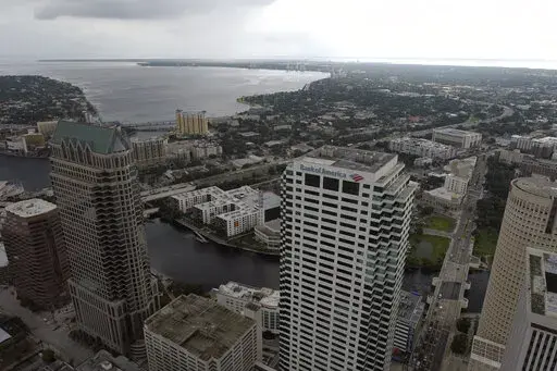 In this aerial image, the city of Tampa, Fla., is seen Monday, Sept. 26, 2022. Hurricane Ian was growing stronger as it barreled toward Cuba on a track to hit Florida's west coast as a major hurricane as early as Wednesday. It's been more than a century since a major storm like Ian has struck the Tampa Bay area, which blossomed from a few hundred thousand people in 1921 to more than 3 million today. (DroneBase via AP)