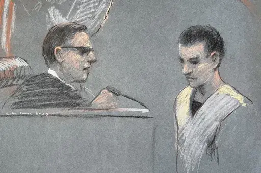 This artist depiction shows Massachusetts Air National Guardsman Jack Teixeira, right, appearing in U.S. District Court in Boston, April 14, 2023. The massive classified documents leak by an Air Force service member earlier this year was made worse by the intentional failure by multiple officials to report to take required action on his suspicious behavior, the Air Force inspector general reported Monday. Massachusetts Air National Guard member Jack Teixeira is accused of leaking highly classifi