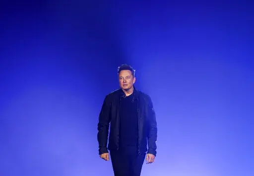 Tesla CEO Elon Musk introduces the Cybertruck at Tesla's design studio on Nov. 21, 2019, in Hawthorne, Calif. Days after taking over Twitter and a week before the 2022 U.S. midterm elections, Musk has positioned himself as moderator-in-chief of one of the most important social media platforms in American politics. (AP Photo/Ringo H.W. Chiu, File)