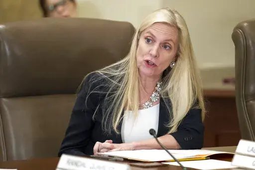 FILE- In this June 14, 2018, file photo Federal Reserve Board Governor Lael Brainard participates in an open meeting in Washington.  The U.S. Senate on Tuesday, April 26, 2022 approved Brainard to a four-year term as vice chair of the Federal Reserve, elevating her to a top policymaking position in the midst of the central bank's toughest fight against inflation in four decades.   (AP Photo/Cliff Owen, File)