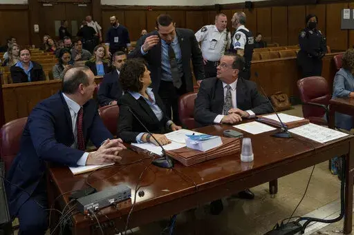 Prosecuting and Defense attorneys wait during the sentencing of the Trump Organization at Manhattan Criminal Court on Friday, Jan. 13, 2023, in New York. (Adam Gray/DailyMail via AP, Pool)