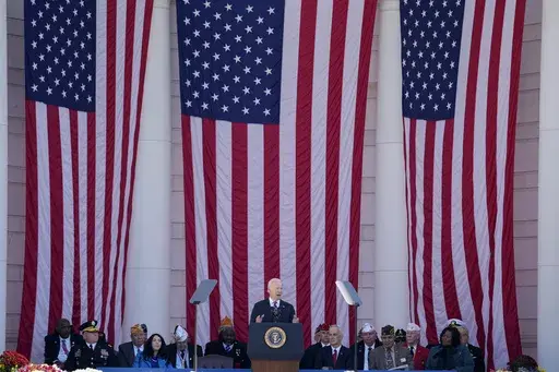 President Joe Biden speaks at the National Veterans Day Observance at the Memorial Amphitheater at Arlington National Cemetery in Arlington, Va., Saturday, Nov. 11, 2023. (AP Photo/Andrew Harnik)