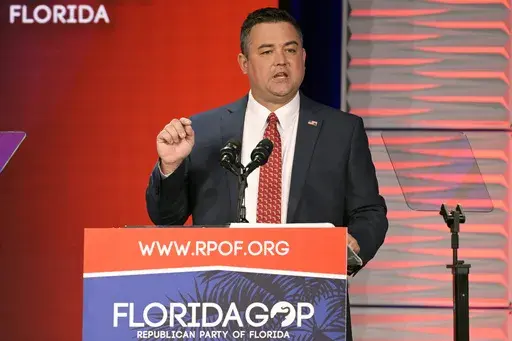 Republican Party of Florida Chairman Christian Ziegler addresses attendees at the Republican Party of Florida Freedom Summit, Saturday, Nov. 4, 2023, in Kissimmee, Fla. Police cleared Ziegler, the ousted chair of the Florida Republican Party, of rape allegations on Friday, Jan 19, 2024, but said they have asked prosecutors to charge him with illegally video recording the sexual encounter he had with a female acquaintance. (AP Photo/Phelan M. Ebenhack, File)