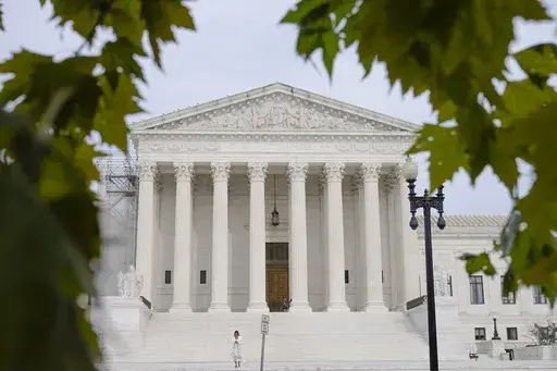 The U.S. Supreme Court is seen, Wednesday, Aug 30, 2023, in Washington. The Supreme Court is taking up a case Wednesday that could make it harder to sue hotels when their websites are not clear enough about their accommodations for people with disabilities. (AP Photo/Mariam Zuhaib, File)