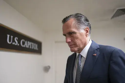 Sen. Mitt Romney, R-Utah, a member of the Senate Foreign Relations Committee, heads to a vote before a national security briefing on Ukraine, at the Capitol in Washington, March 16, 2022. Romney will not run for reelection in 2024. The former presidential candidate and Massachusetts governor announced his intentions in a video statement Wednesday. (AP Photo/J. Scott Applewhite, File)