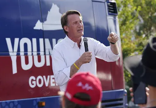Virginia Gov. Glenn Youngkin addresses the crowd during an early voting rally Sept. 21, 2023, in Petersburg, Va. (AP Photo/Steve Helber, File)