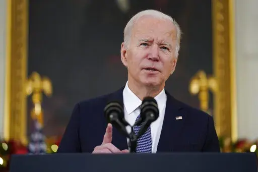 President Joe Biden delivers remarks on the November jobs report, in the State Dining Room of the White House, Friday, Dec. 3, 2021, in Washington. (AP Photo/Evan Vucci)