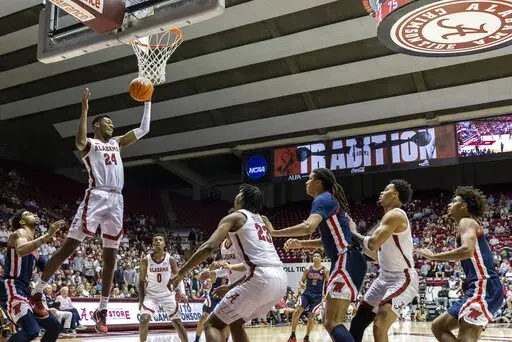 Alabama forward Brandon Miller (24) rebounds against Mississippi during the first half of an NCAA college basketball game, Tuesday, Jan. 3, 2023, in Tuscaloosa, Ala. (AP Photo/Vasha Hunt)