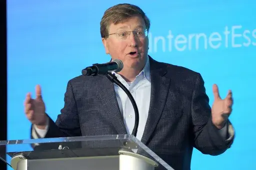 Republican Gov. Tate Reeves speaks in Bolton, Miss., Tuesday, Aug. 22, 2023. As Brett Favre became ensnared in media attention for his connection to Mississippi's sprawling welfare scandal, Reeves' brother suggested the state official investigating the case praise the retired NFL quarterback, according to screen shots of text messages released Thursday, Aug. 31, 2023, by Reeves' re-election campaign. (AP Photo/Rogelio V. Solis, File)