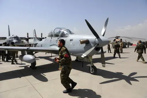 A-29 Super Tucano planes are on display during a handover from the NATO-led Resolute Support mission to the Afghan army at the military Airport in Kabul, Afghanistan, Sept. 17, 2020. A year-old report by Washington’s Afghanistan watchdog warned in early 2021, months before President Joe Biden announced the end to America’s longest war, the Afghan air force would collapse without critical U.S. aid, training and American maintenance. The report by the Special Inspector General for Afghanistan 