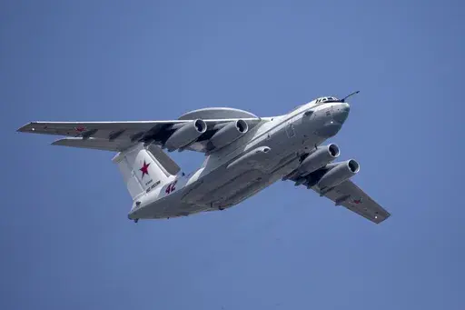 A Russian Beriev A-50 airborne early warning and control plain flies over Red Square during a rehearsal for the Victory Day military parade in Moscow, Russia, on May 7, 2019. Ukraine’s military chief is claiming that the Ukrainian air force has shot down a Russian Beriev A-50 early warning and control plane and an IL-22 command center aircraft. (AP Photo/Alexander Zemlianichenko, Pool, File)