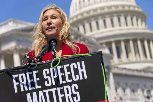 U.S. Rep. Marjorie Taylor Greene, R-Ga., speaks about Twitter, April 28, 2022, on Capitol Hill in Washington. Once shunned as a political pariah for her extremist rhetoric, the Georgia lawmaker who spent her first term in Congress stripped of institutional power by Democrats is being celebrated by Republicans and welcomed into the GOP fold. (AP Photo/Jacquelyn Martin, File)