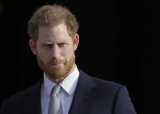 Britain's Prince Harry arrives in the gardens of Buckingham Palace in London, Jan 16, 2020. Buckingham Palace says Prince Harry will attend the Coronation service of his father, King Charles III, at Westminster Abbey on May 6, setting aside months of speculation about his presence. (AP Photo/Kirsty Wigglesworth, File)