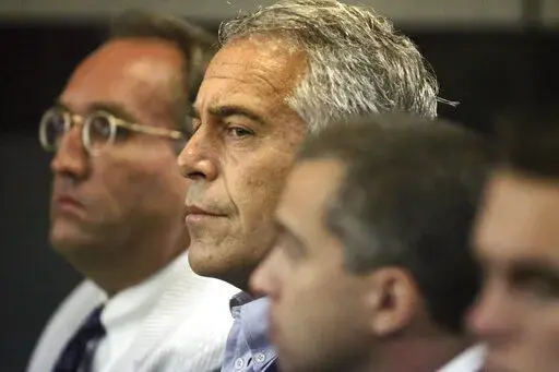 FILE- Jeffrey Epstein appears in court in West Palm Beach, Fla., July 30, 2008. A modeling agent who was close to disgraced U.S. financier Jeffrey Epstein was found dead Saturday in his French jail cell, where he was being held in an investigation into the rape of minors and trafficking of minors for sexual exploitation, according to the Paris prosecutor's office. (Uma Sanghvi/Palm Beach Post via AP, File)
