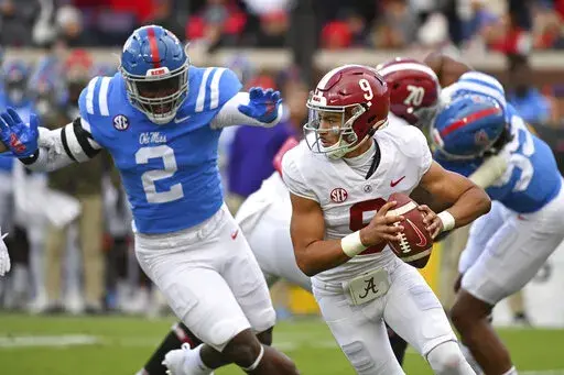 Alabama quarterback Bryce Young looks to pass during the first half of an NCAA college football game against Mississippi in Oxford, Miss., Saturday, Nov. 12, 2022. (AP Photo/Thomas Graning)