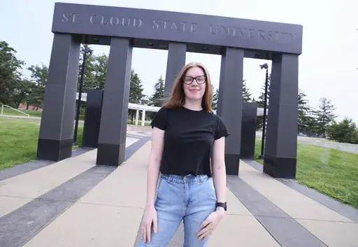University student Christina Westman poses at St. Cloud State University, Tuesday, July 30, 2024, in St. Cloud, Minn. (AP Photo/Adam Bettcher)