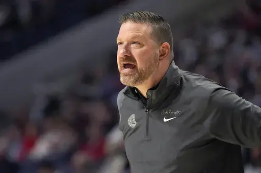 Mississippi head coach Chris Beard shouts instructions to his team during the first half of an NCAA college basketball game against Alabama, Wednesday, Feb. 28, 2024, in Oxford, Miss. Mississippi coach Chris Beard has agreed to a new contract after a debut season when he won his first 13 games to earn a national ranking. Keith Carter, the Ole Miss vice chancellor for intercollegiate athletics, announced the new deal on Wednesday, March 13, 2024. (AP Photo/Rogelio V. Solis, File)