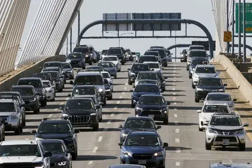 Heavy traffic heads south on Interstate 93 over the Zakim Bridge, Sept. 1, 2023, in Boston. Crash and fatality rates among drivers under 21 have fallen dramatically during the past 20 years, according to a new report made public Wednesday, Oct. 18, while noting young drivers are still by far the riskiest group behind the wheel. (AP Photo/Michael Dwyer, File)