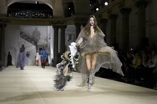 Models wear creations as part of the Vivienne Westwood Fall/Winter 2025-2026 Womenswear collection presented in Paris, Saturday, March 8, 2025. (Photo by Scott A Garfitt/Invision/AP)