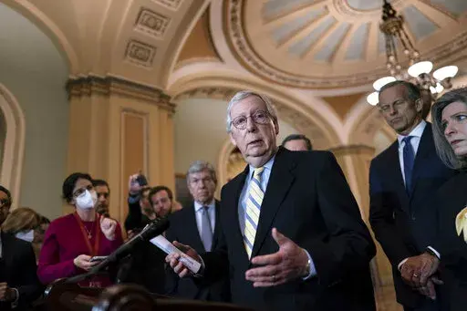 Senate Minority Leader Mitch McConnell, R-Ky., talks with reporters at the Capitol in Washington, April 5, 2022. (AP Photo/J. Scott Applewhite, file)