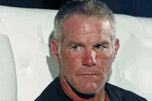 Retired NFL quarterback Brett Favre participates in a question and answer session at a fundraiser for Willowood Developmental Center, a facility that provides training and assistance for special needs students, Wednesday, Oct. 17, 2018 in Jackson, Miss. (AP Photo/Rogelio V. Solis, File)